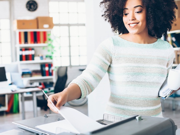 Woman at a printer